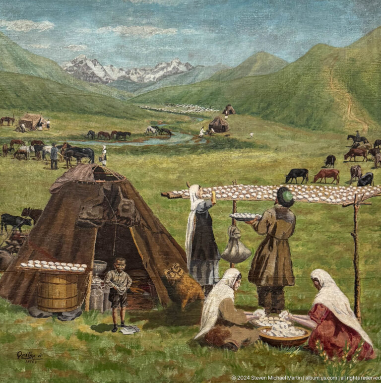 Nomadic camp with yurt and livestock.