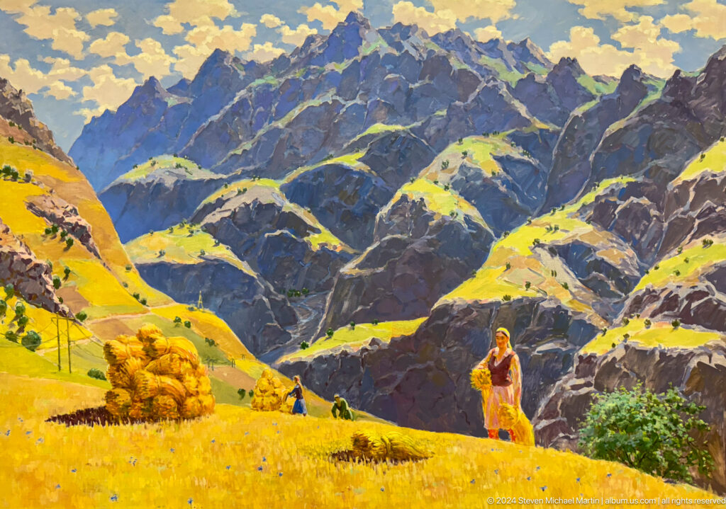 Bright mountain valley with haystacks.