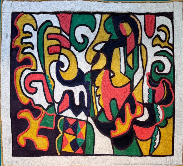 Bold multicolored abstract textile design.