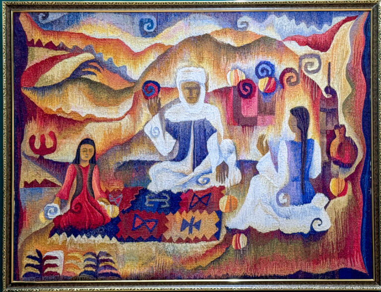 Textile scene of seated musicians or storytellers.