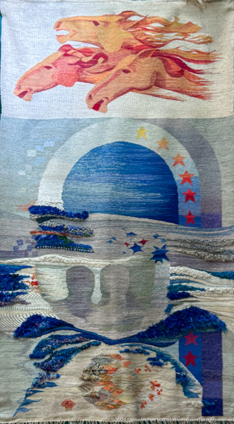 Blue and gray cosmic landscape textile.