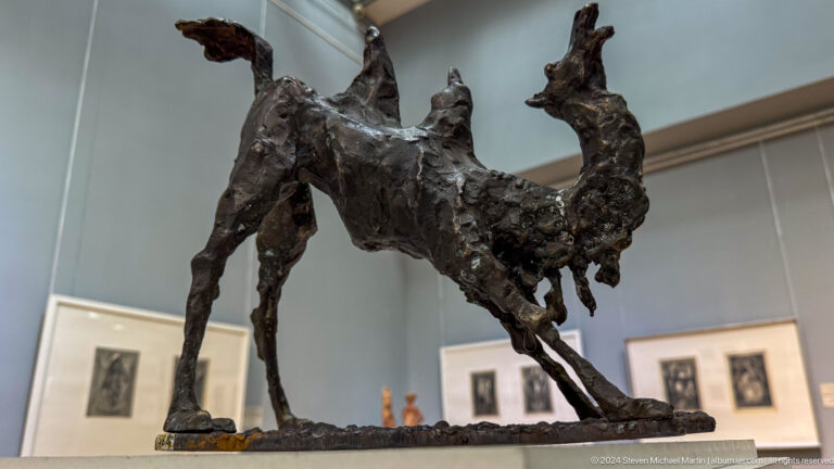 Dynamic dark horse sculpture.