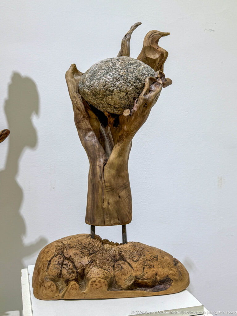 Carved wooden branching form.