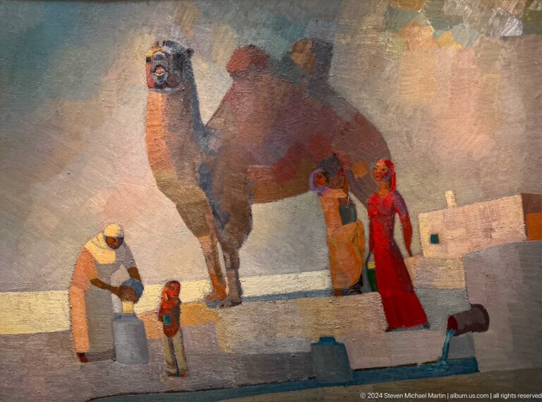 Figures working around large elephant-like form.