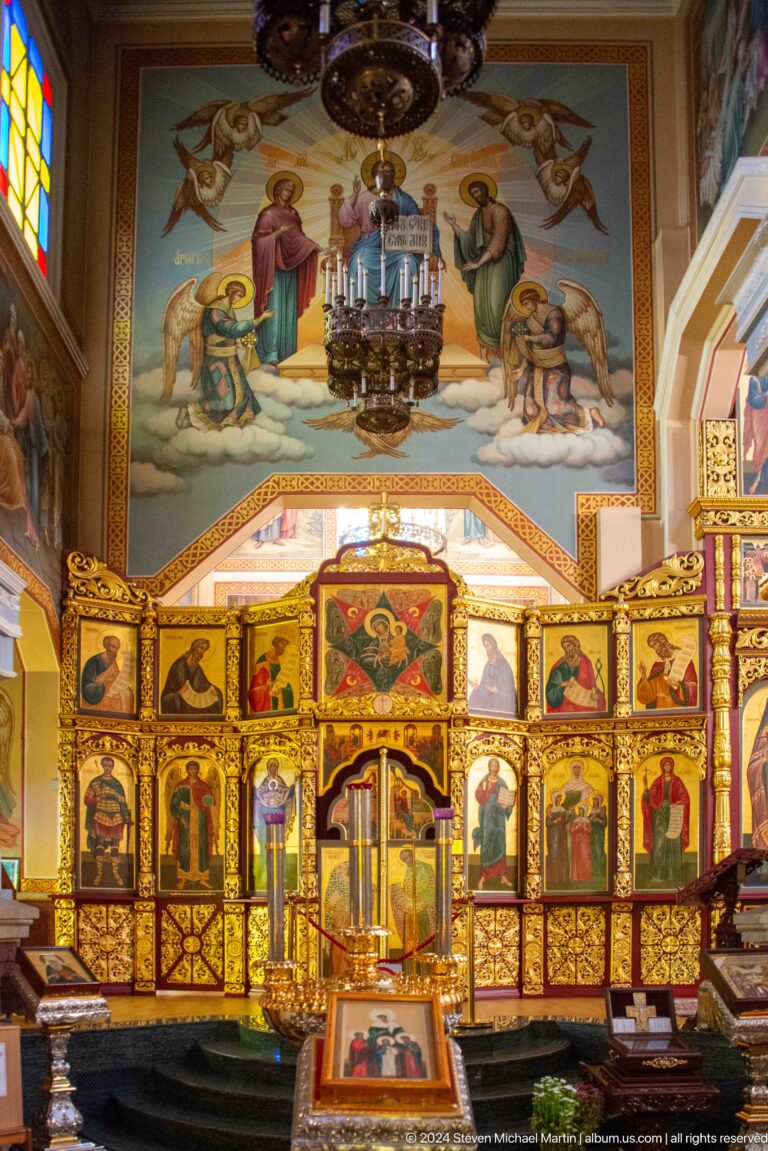 Iconostasis and painted ceiling inside Zenkov Cathedral, with Orthodox religious decoration.