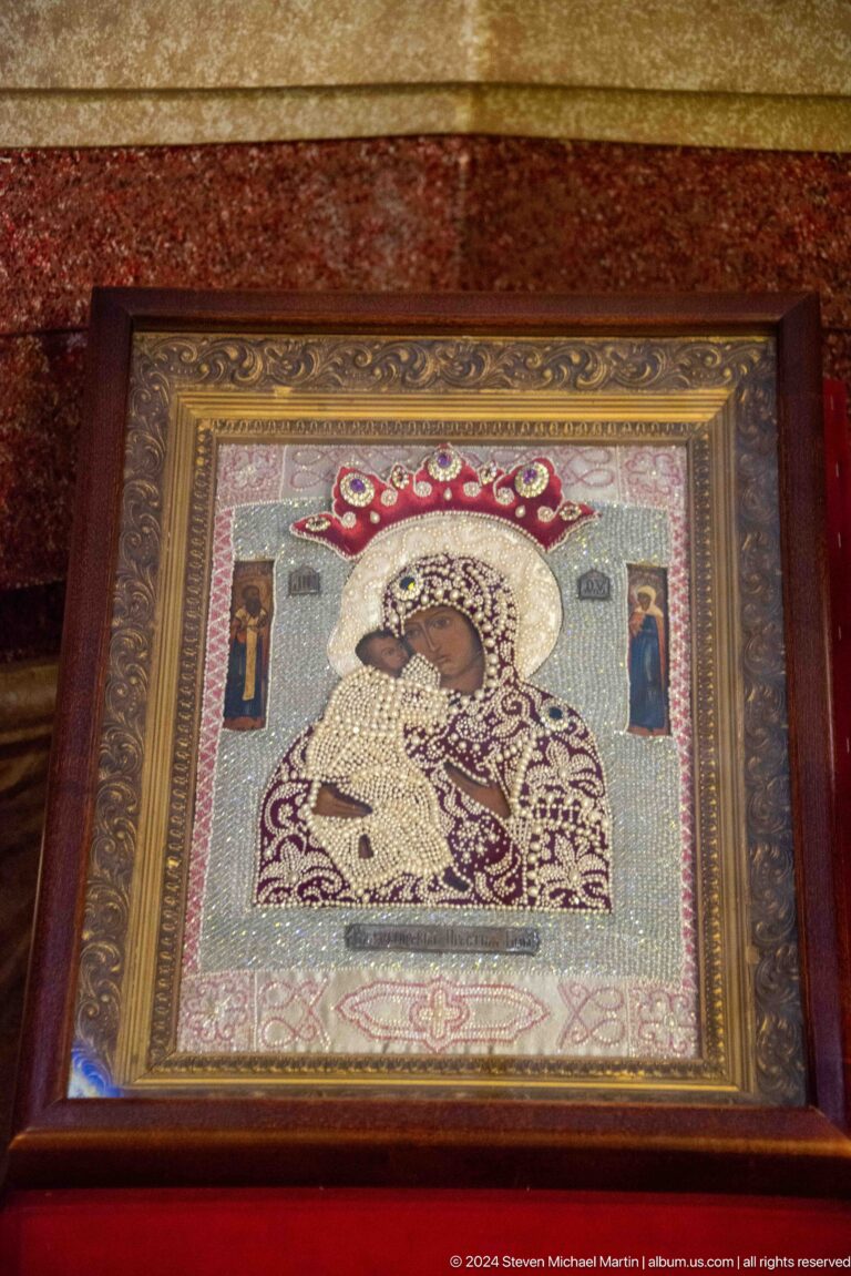 Jeweled icon of the Virgin and Child inside Zenkov Cathedral, with Orthodox religious decoration.