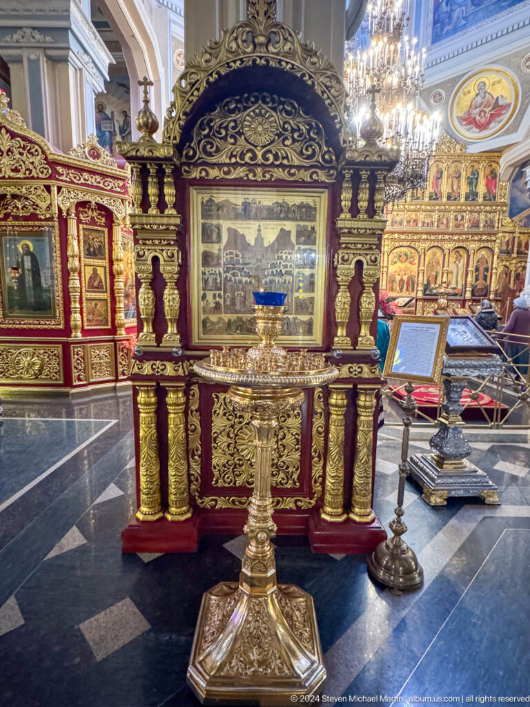 Gilded reliquary or icon case inside Zenkov Cathedral, with Orthodox religious decoration.