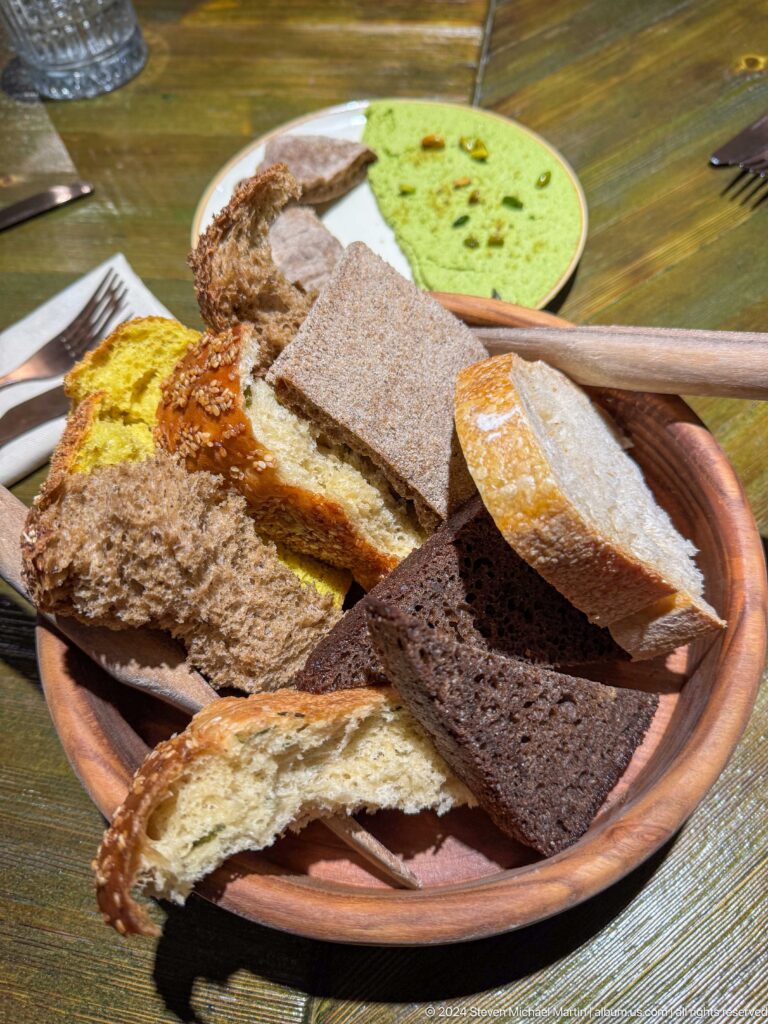 Basket of assorted dark and light breads in Bishkek, Kyrgyzstan.