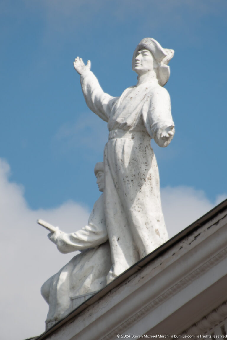 Close crop of draped white statue in Bishkek, Kyrgyzstan.