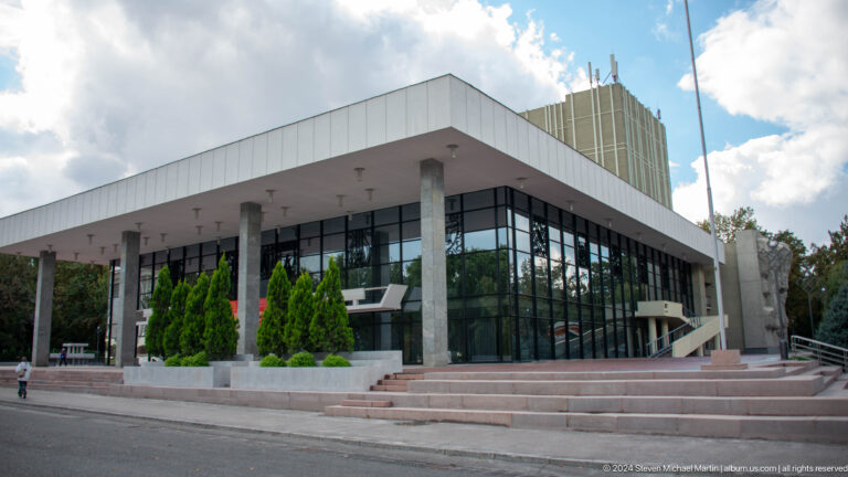 Modern low cultural building with glass walls in Bishkek, Kyrgyzstan.