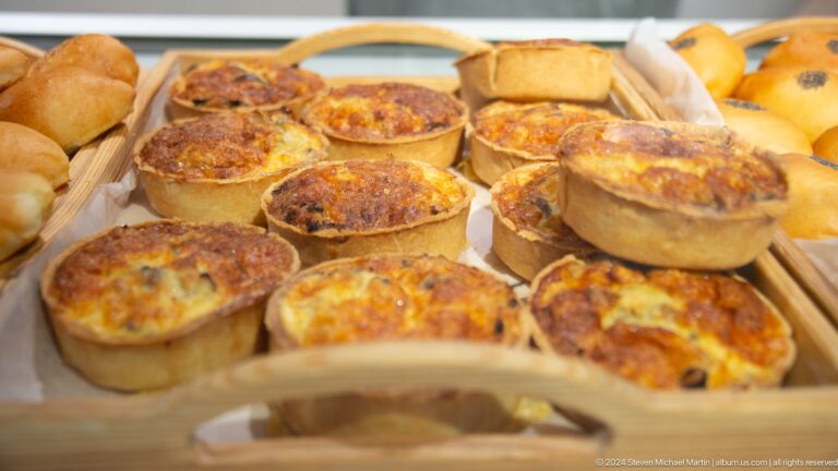 Round savory pastries stacked on tray in Bishkek, Kyrgyzstan.