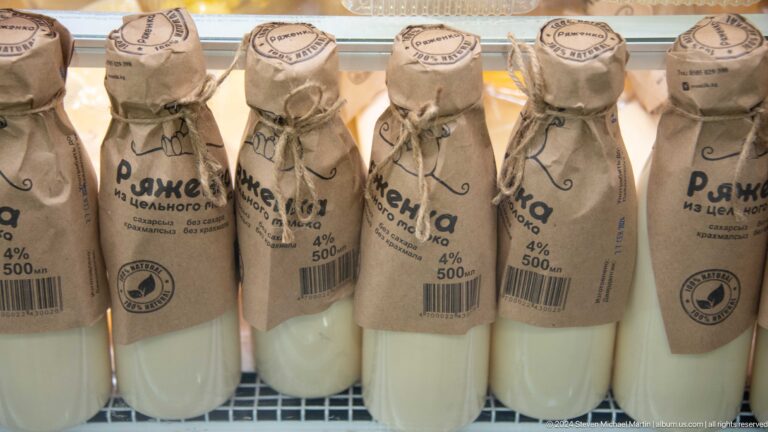 Bottles of dairy drink wrapped in paper labels in Bishkek, Kyrgyzstan.