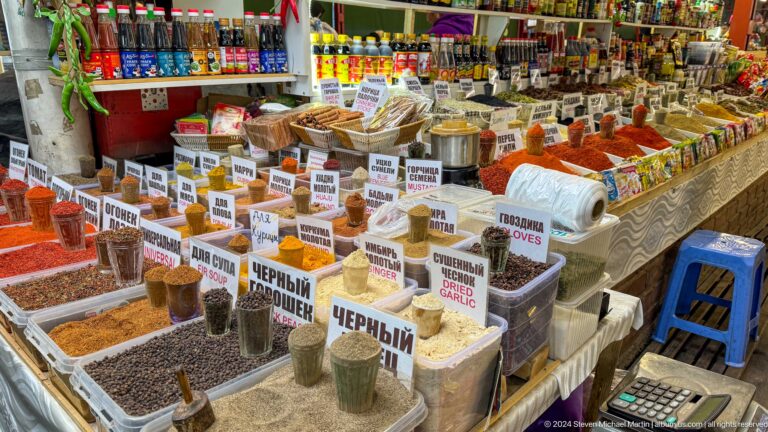 Bags and bins of spices with Cyrillic labels in Bishkek, Kyrgyzstan.