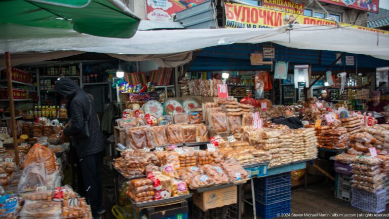 Stall piled with breads and packaged foods in Bishkek, Kyrgyzstan.