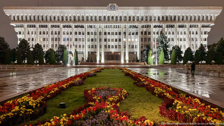 Government complex behind formal flower beds in Bishkek, Kyrgyzstan.