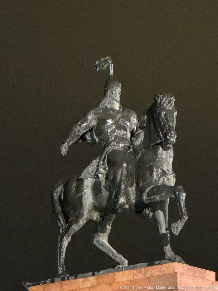 Bronze mounted rider viewed from below in Bishkek, Kyrgyzstan.