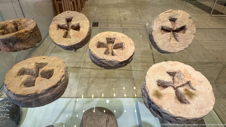 Group of circular stone disks with central holes.