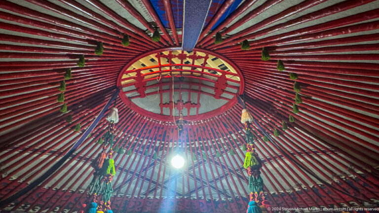 Yurt roof viewed upward toward circular tunduk.