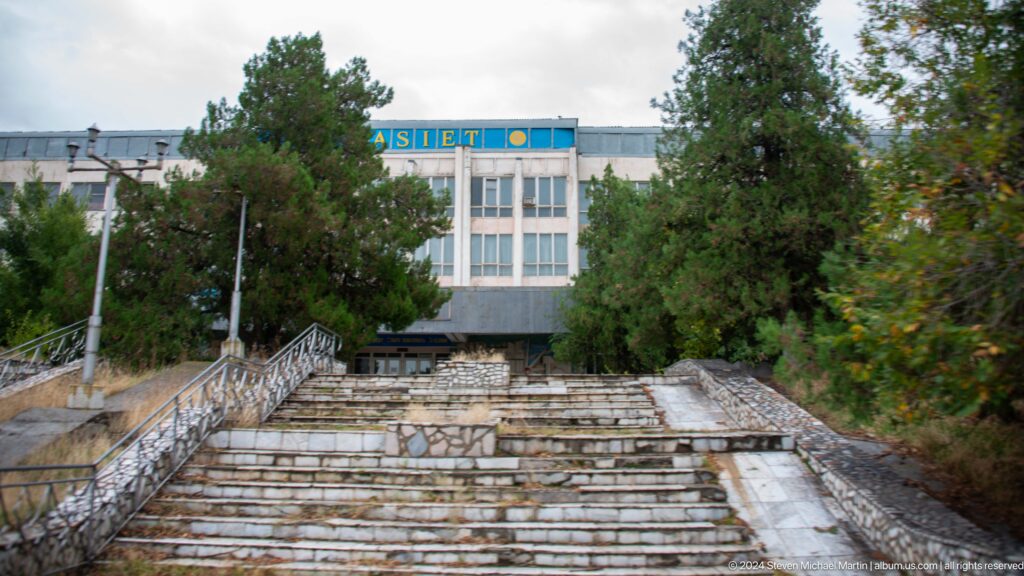 Broad stone steps leading to a civic building.