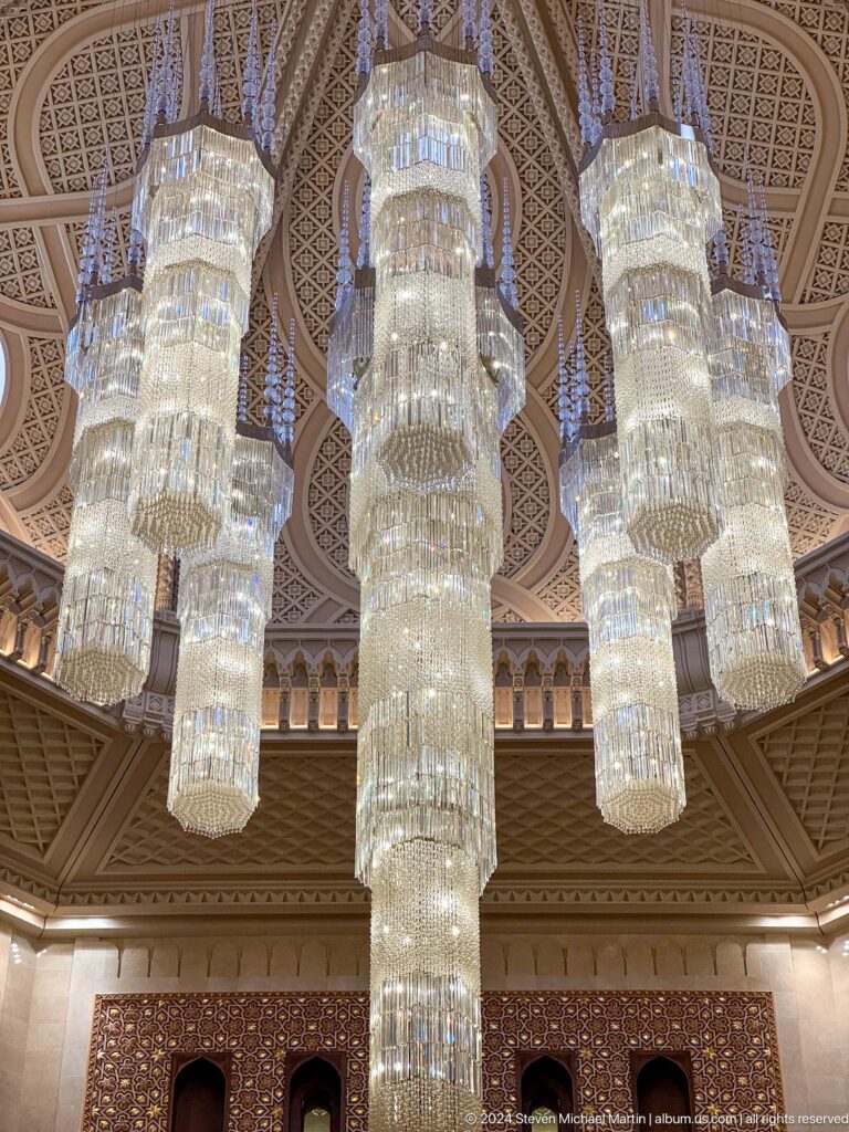 Close-up of crystal chandelier tiers in Muscat, Oman.