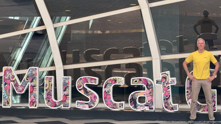 Close crop of Muscat hashtag lettering on glass in Muscat, Oman.