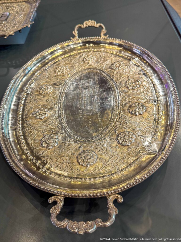 Round metal tray with incised concentric decoration in Muscat, Oman.