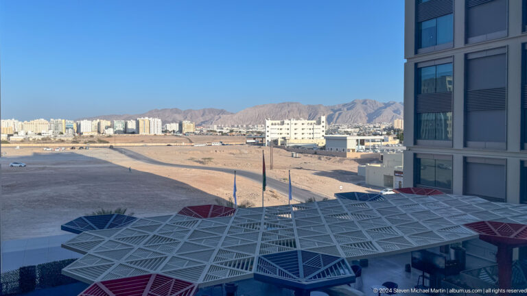 Flat rooftop or terrace overlooking modern Muscat in Muscat, Oman.