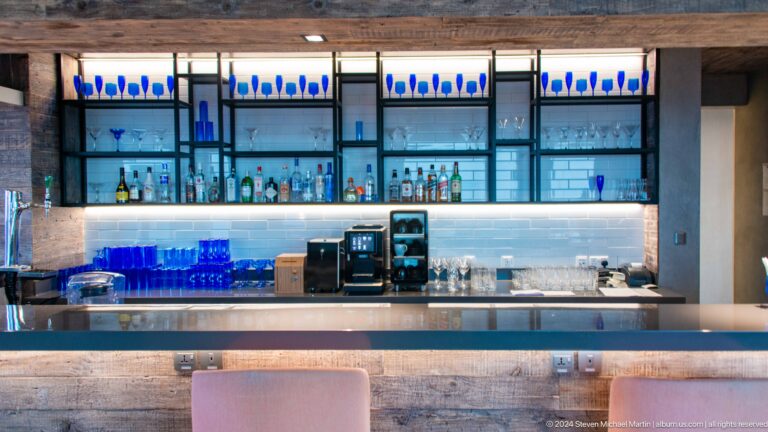 Illuminated hotel or restaurant bar with glass shelving in Muscat, Oman.