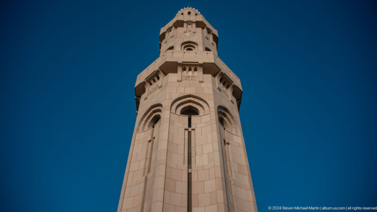 Square minaret viewed from below in Muscat, Oman.