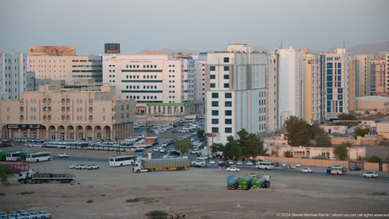 Dense cluster of modern hotels and apartment blocks in Muscat, Oman.