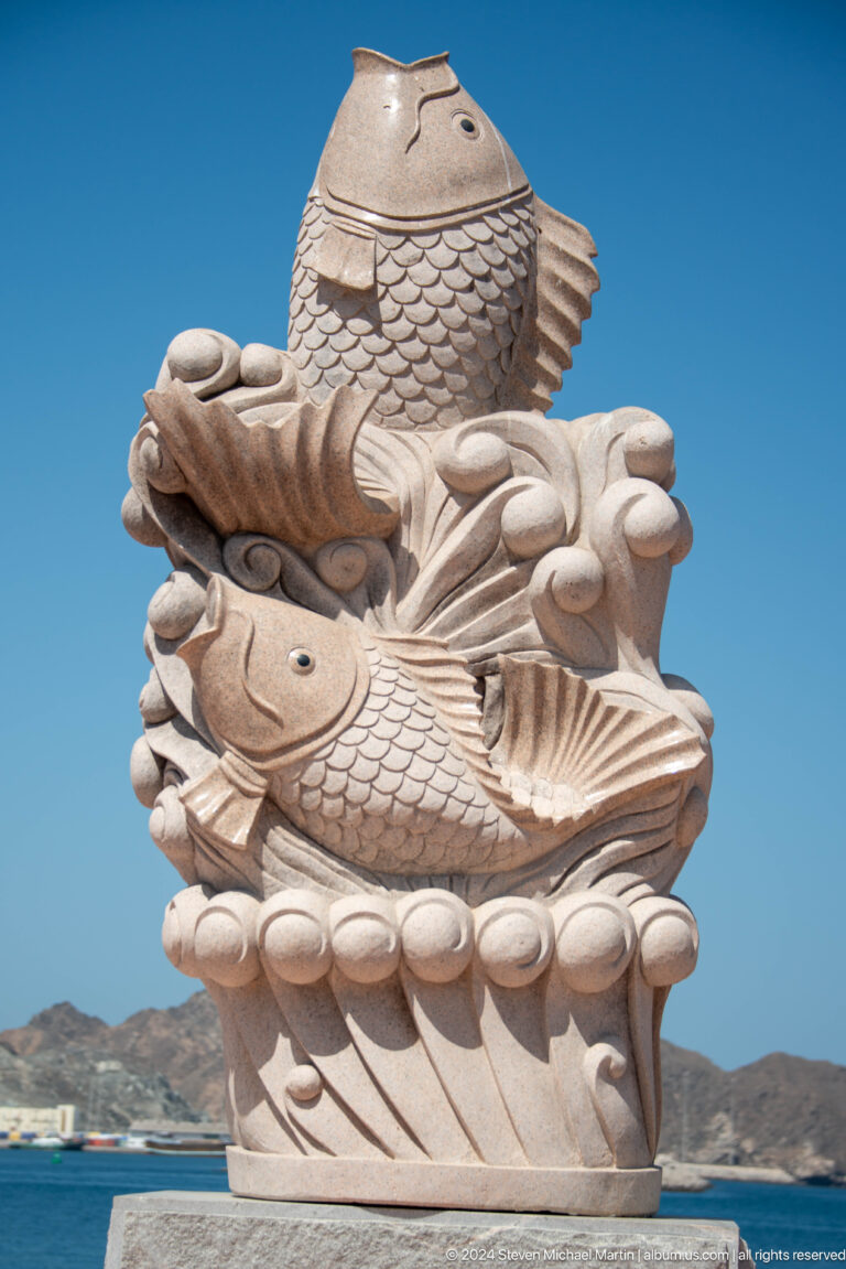 Carved stone dragon or fish architectural ornament.