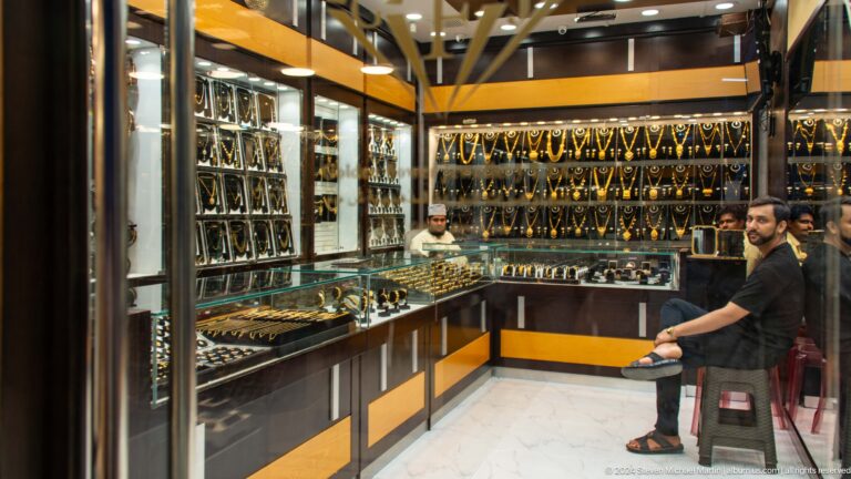 Modern jewelry shop interior with glass displays.