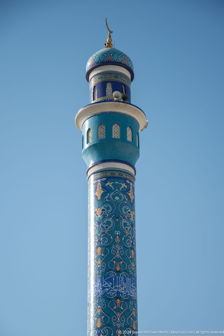Close view of blue patterned minaret shaft.