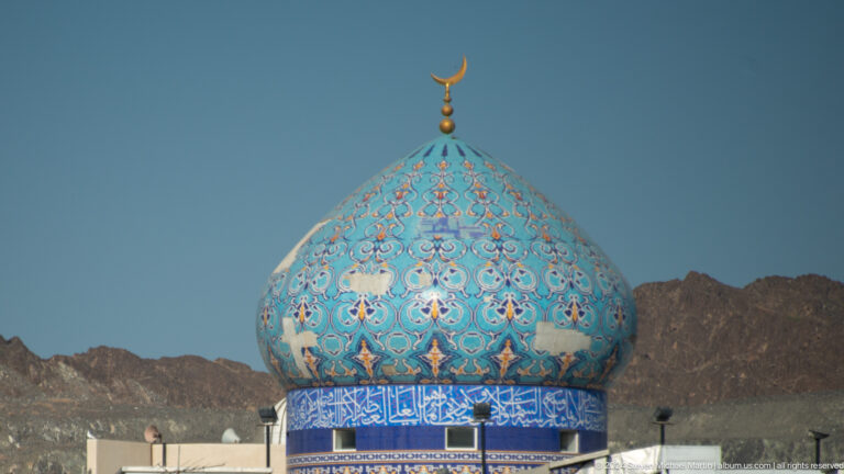 Turquoise patterned mosque dome.