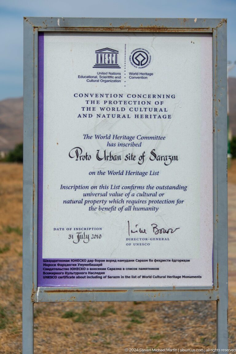 Framed UNESCO World Heritage inscription certificate naming the Proto-urban Site of Sarazm.