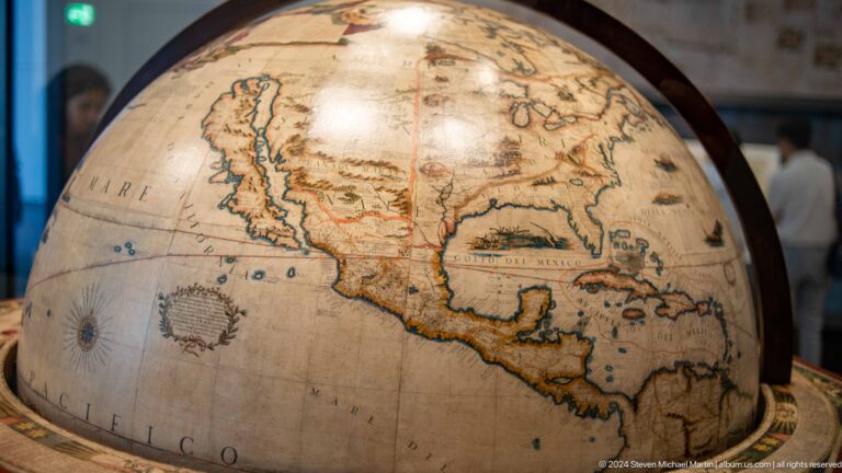 Antique terrestrial globe focused on the americas at Louvre Abu Dhabi.