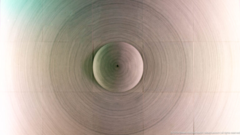 Concentric circular artwork with central depression at Louvre Abu Dhabi.
