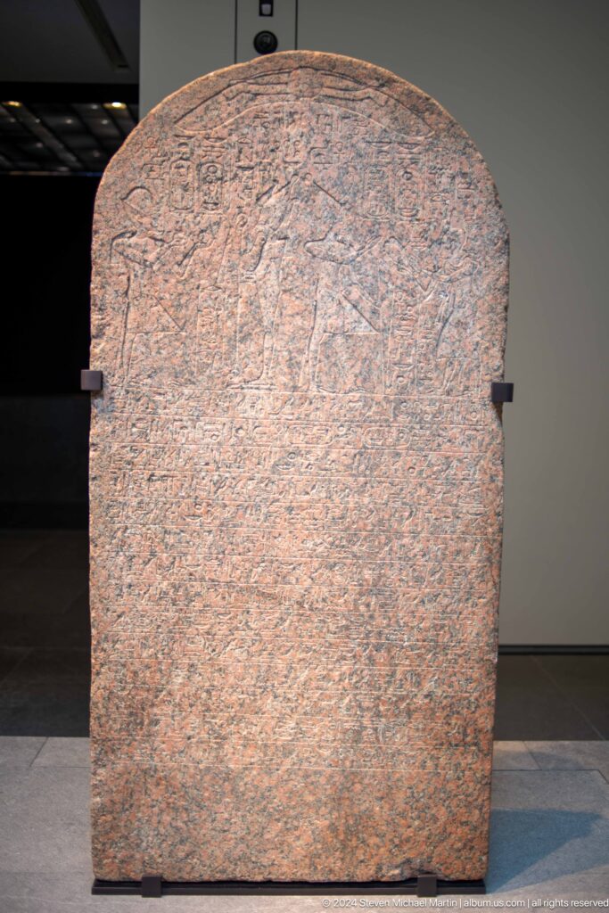 Large inscribed stone slab at Louvre Abu Dhabi.