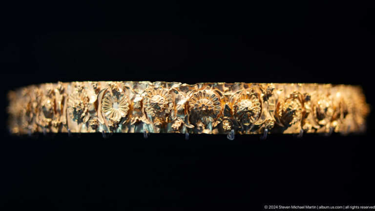 Long encrusted or decorated ancient rod at Louvre Abu Dhabi.