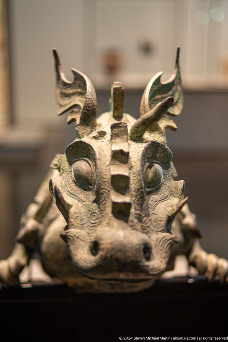 Close view of fantastic animal head sculpture at Louvre Abu Dhabi.