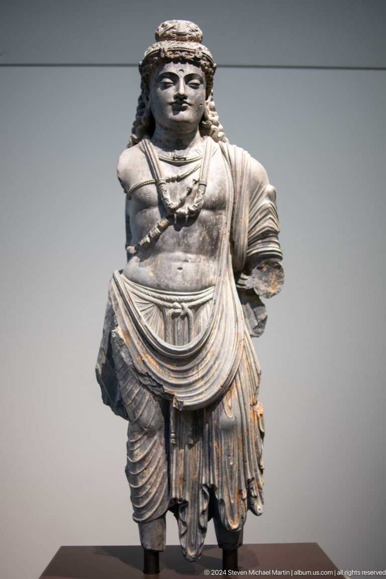 Torso of armored classical statue at Louvre Abu Dhabi.