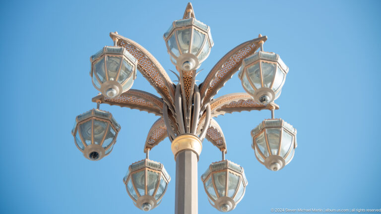 Ornate multi-lantern streetlight.