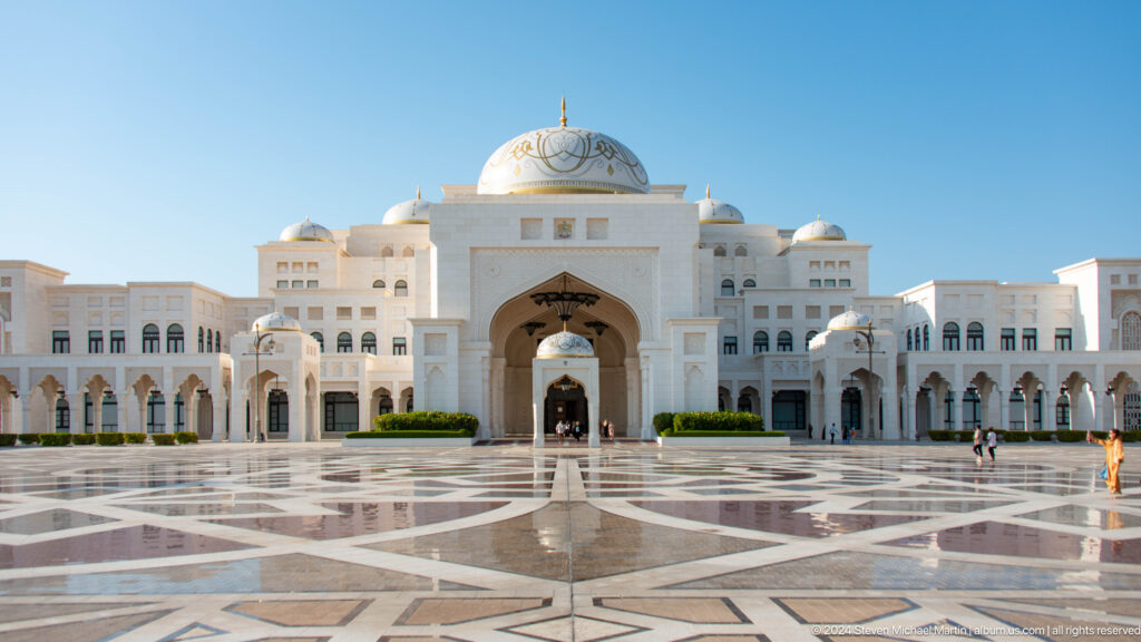 Wide palace courtyard with patterned paving.