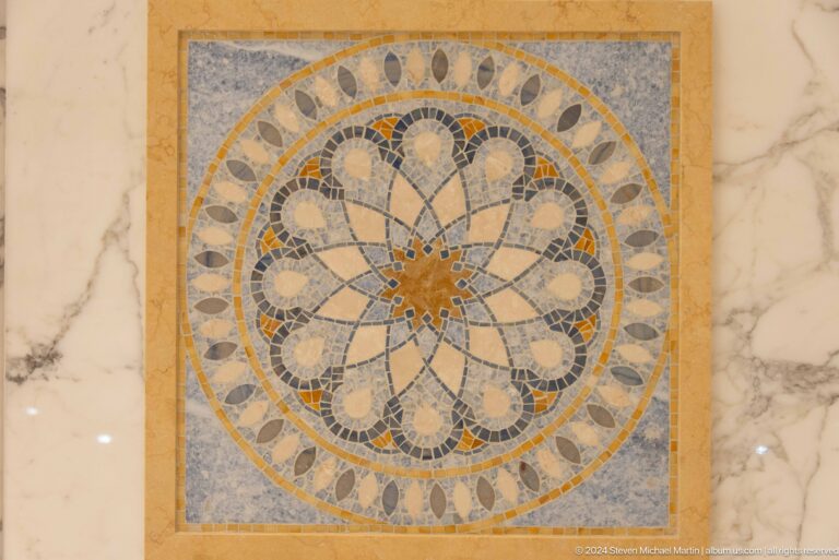 Circular floral marble medallion.