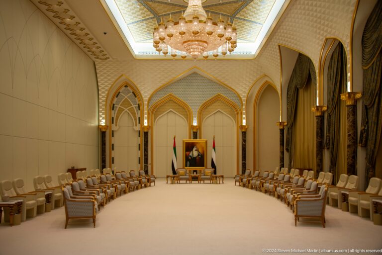 Formal majlis-style room with symmetrical seating.