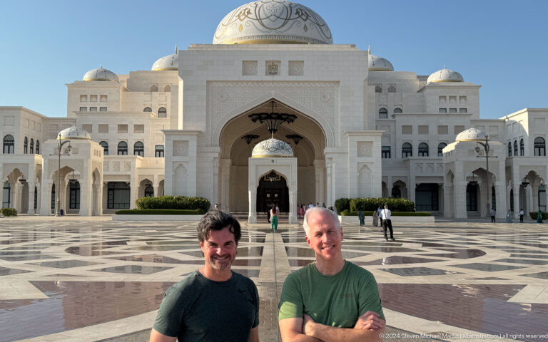 Closer portrait of two visitors at palace.