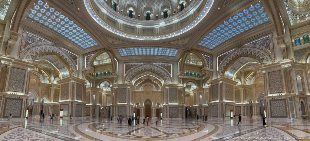 Wide great hall interior with visitors.