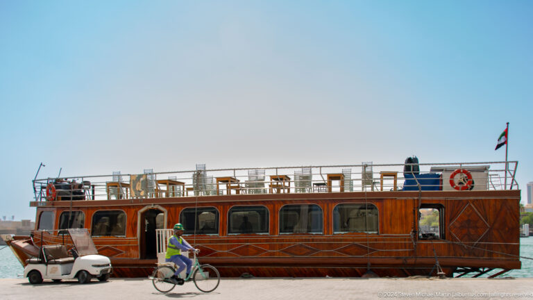 Wooden passenger abra traveling on Dubai Creek.