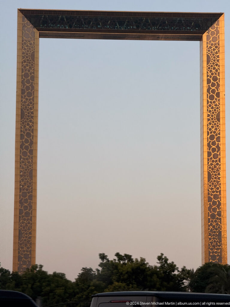 Narrow vertical detail of Dubai Frame’s gold patterned cladding.
