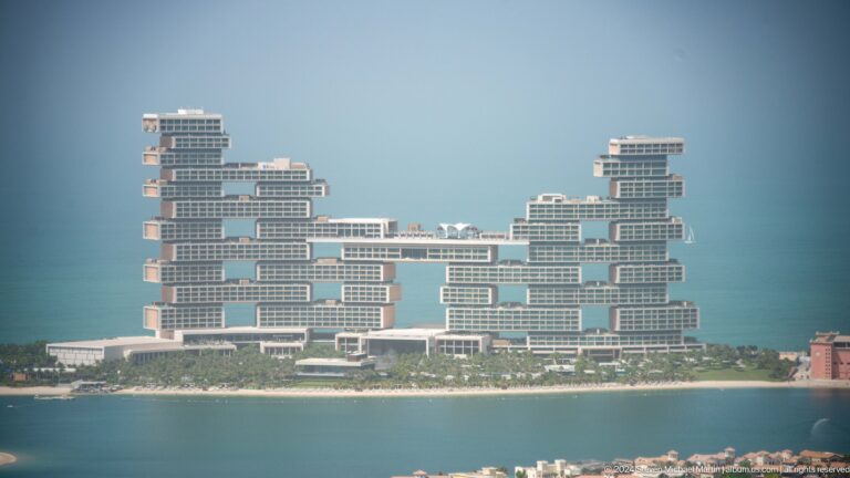 Atlantis The Royal resort with stacked block-like towers and a high central connection.